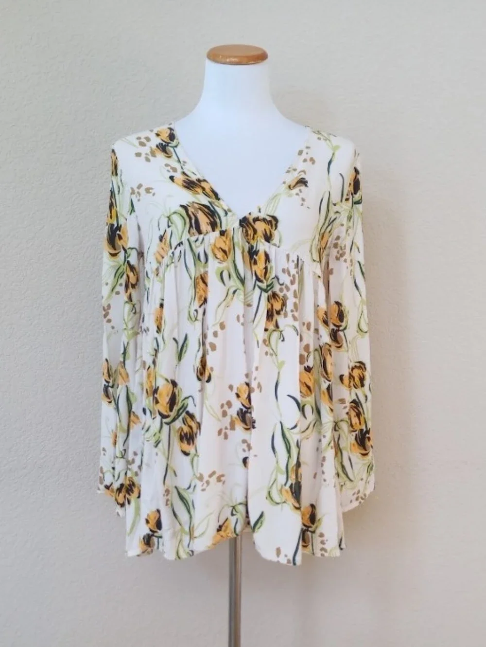 Free People lightweight peasant blouse with a flattering V-neck